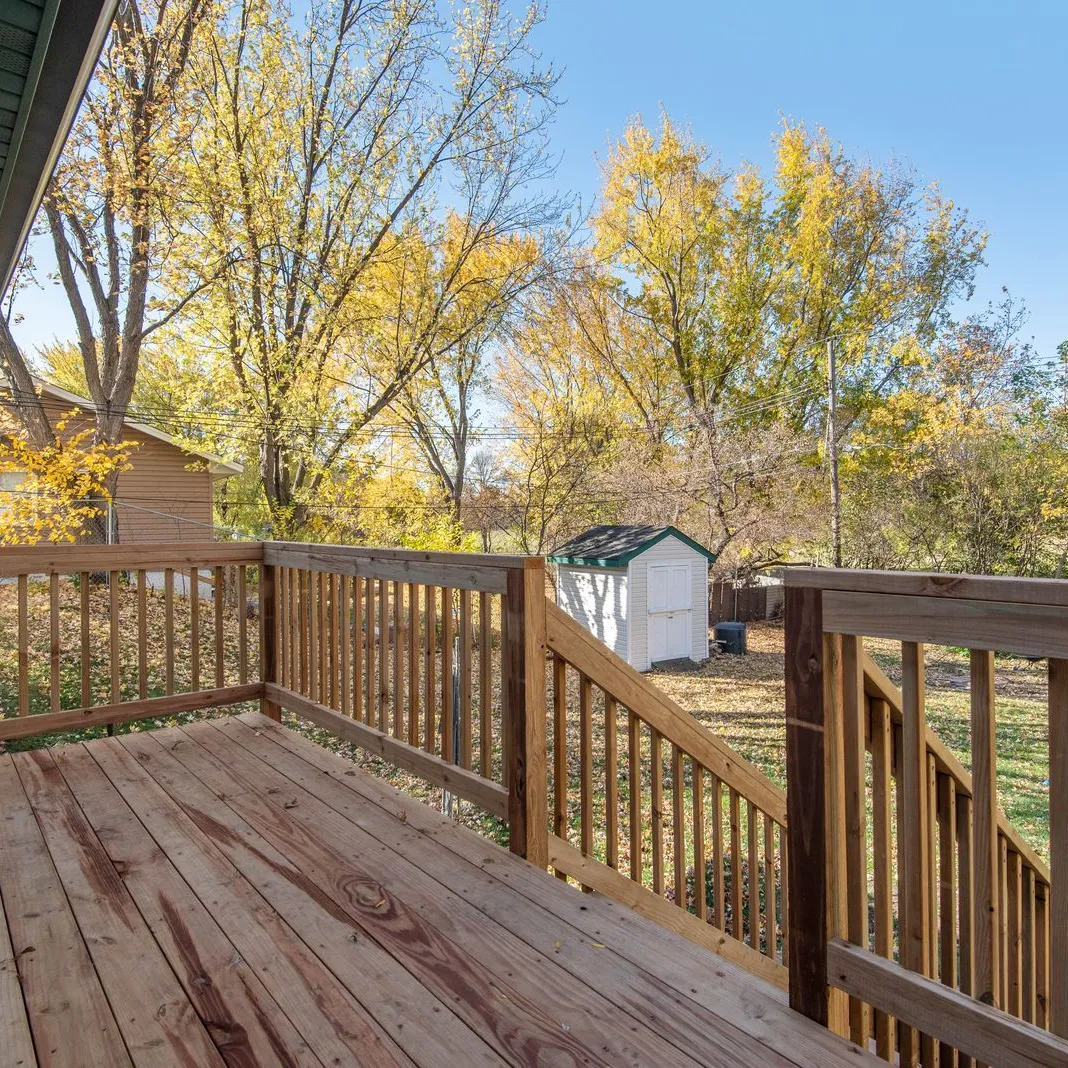 Finished backyard deck overlooking the yard